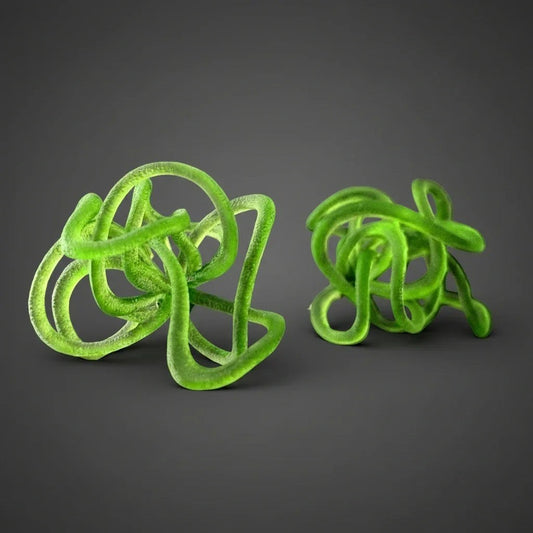 Front view of statement green earrings in a bold sculptural design.