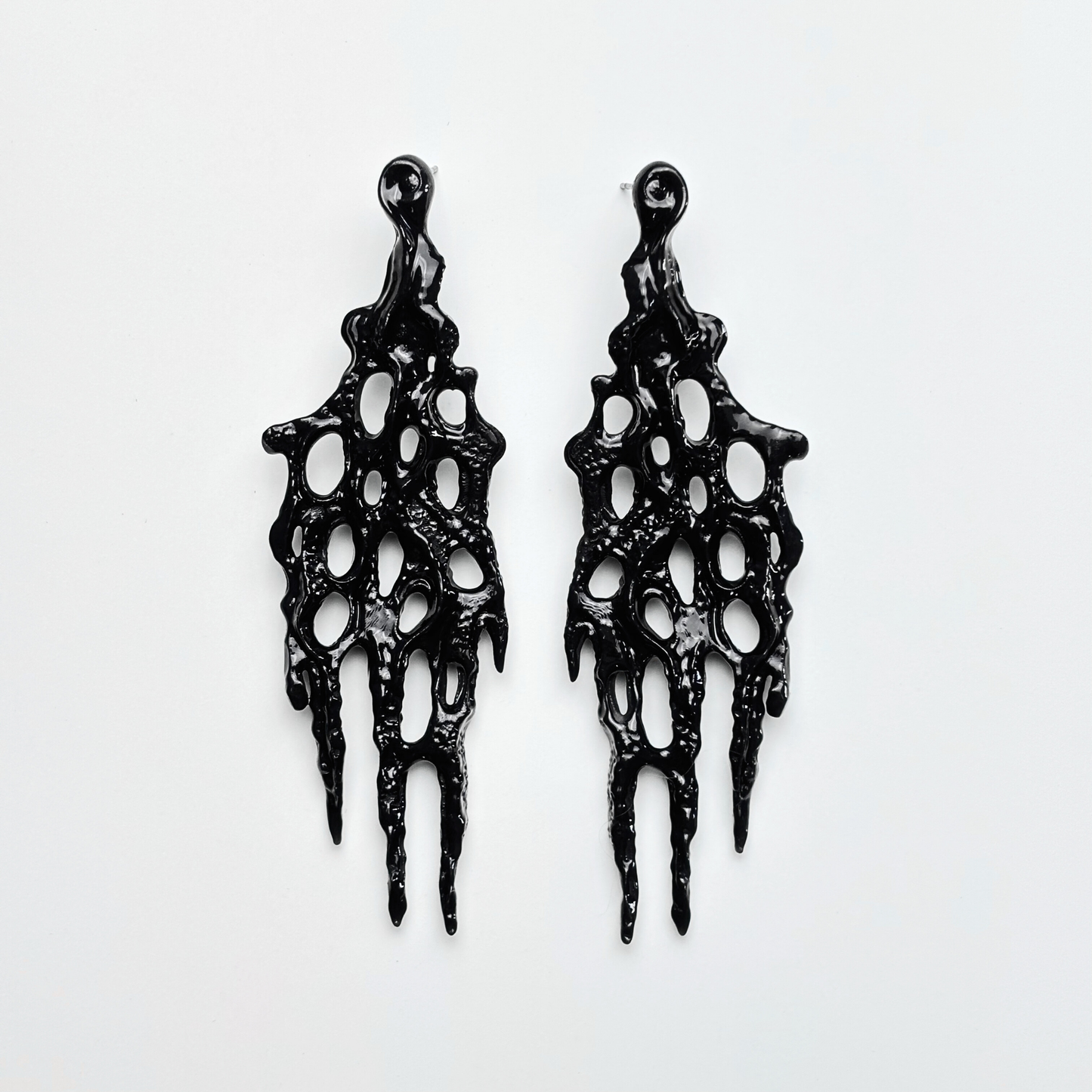 black 3d printed goth earrings on the white background