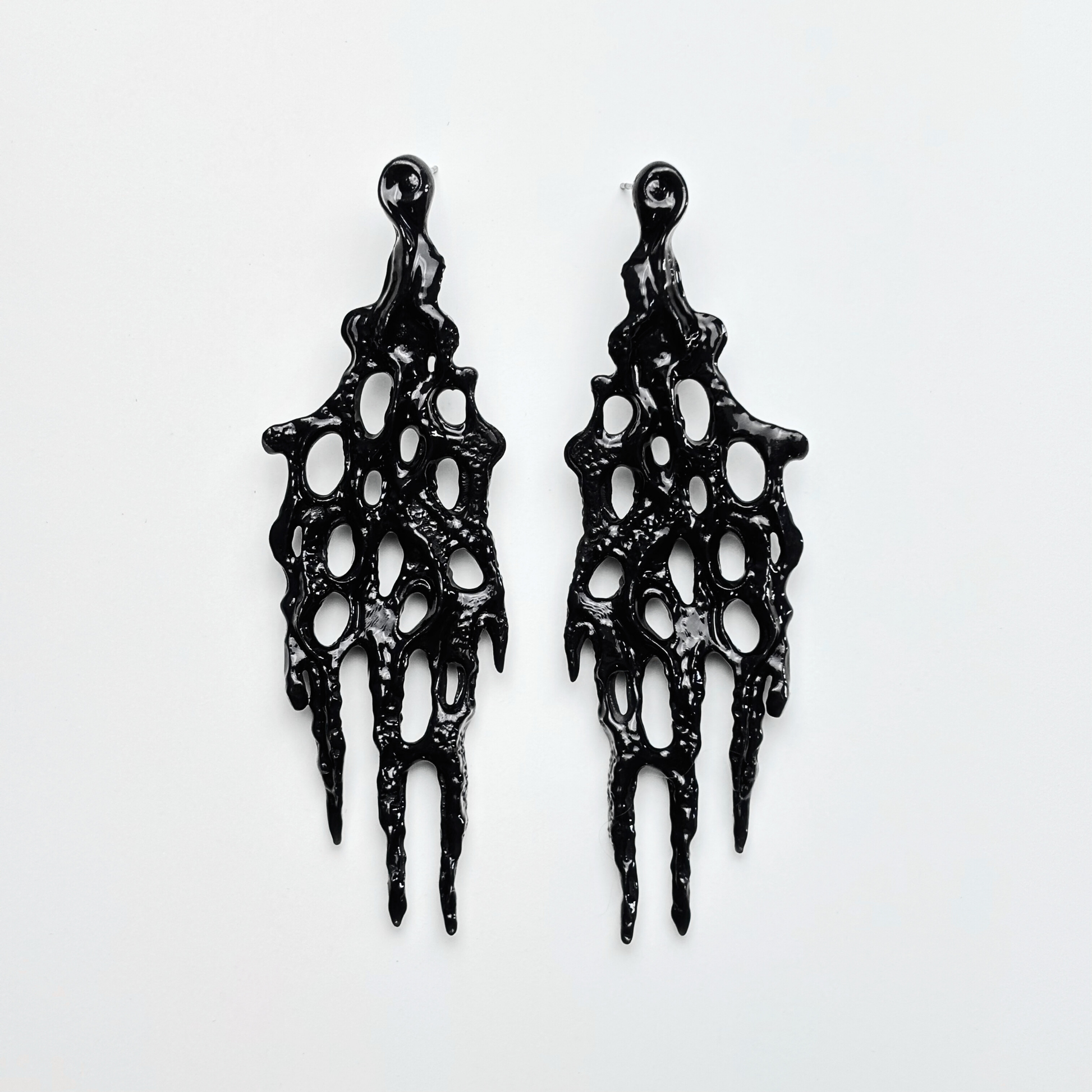 black 3d printed goth earrings on the white background