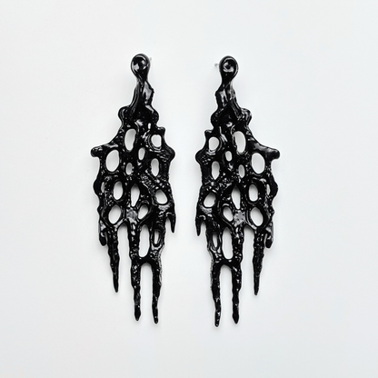 black 3d printed goth earrings on the white background