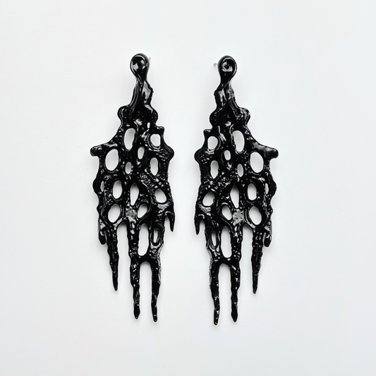 black 3d printed goth earrings on the white background