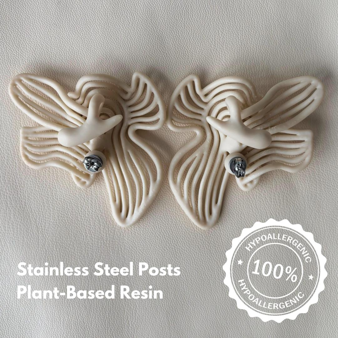 Close-up detail of smooth flowing lines texture and hypoallergenic post
