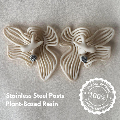 Close-up detail of smooth flowing lines texture and hypoallergenic post
