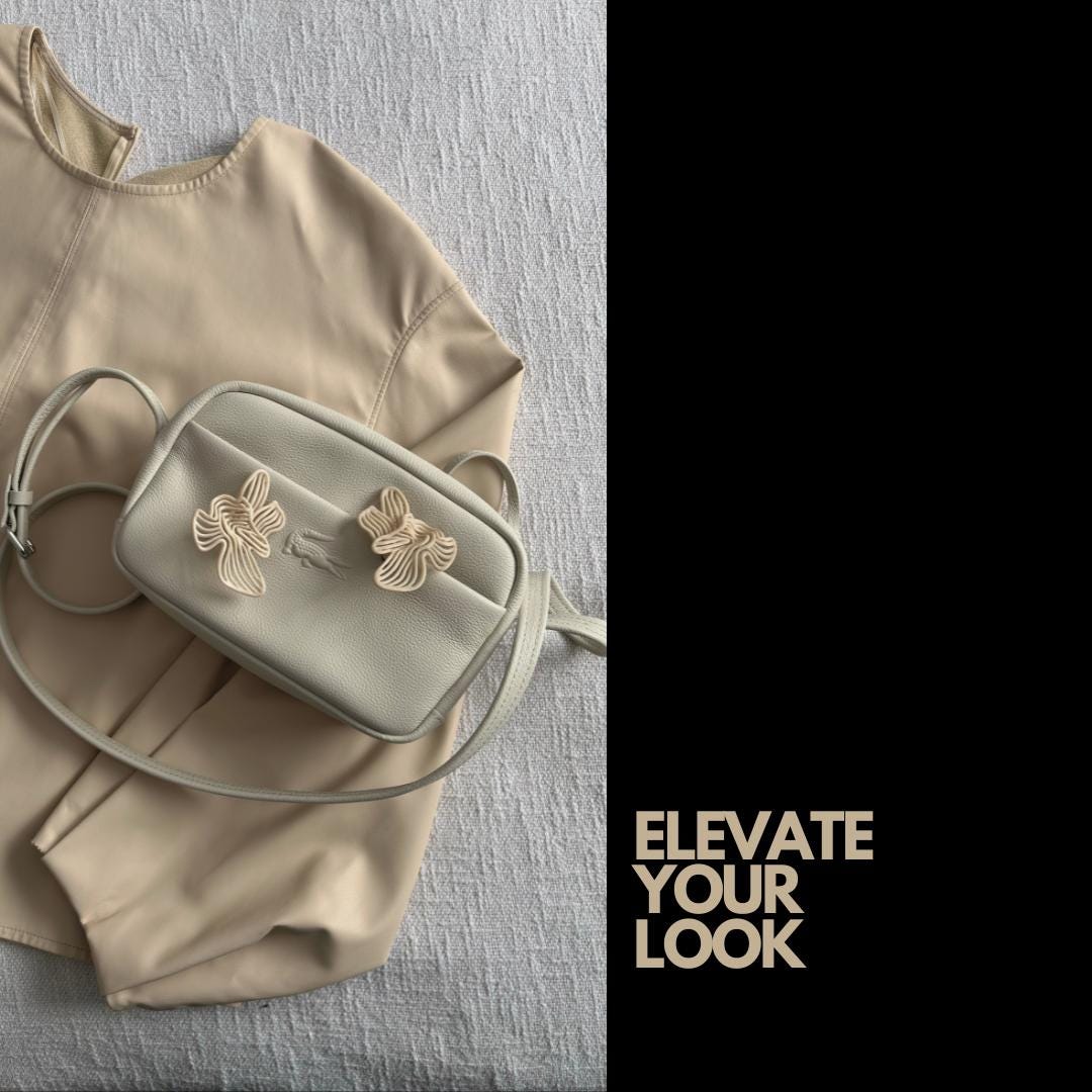 Flat lay of beige Rhythm earrings styled with cozy sweater and neutral bag