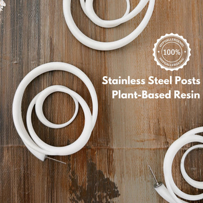 Rear view of swirl hoops showing stainless steel posts and plant-based resin tag