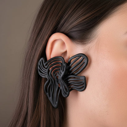 Edgy gothic jewelry on model, emphasizing the size and dark aesthetic jewelry appeal.