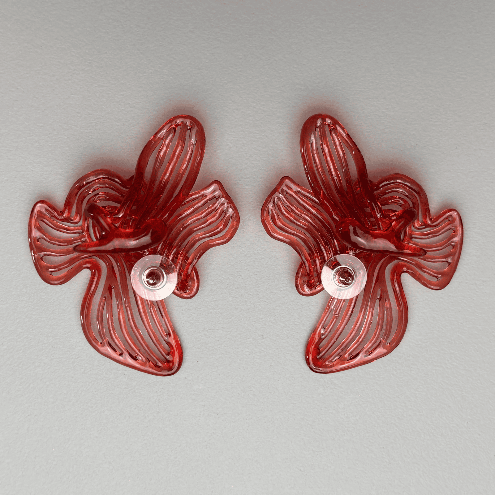 Back view of the sculptural piece, highlighting the lightweight construction for fashion statement jewellery.