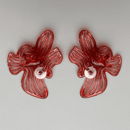 Back view of the sculptural piece, highlighting the lightweight construction for fashion statement jewellery.