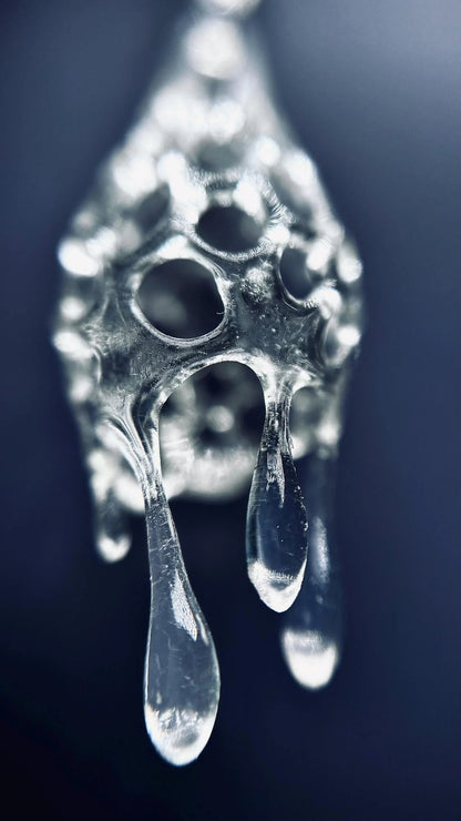 Macro shot detailing the unique texture of the unique designer statement earrings.