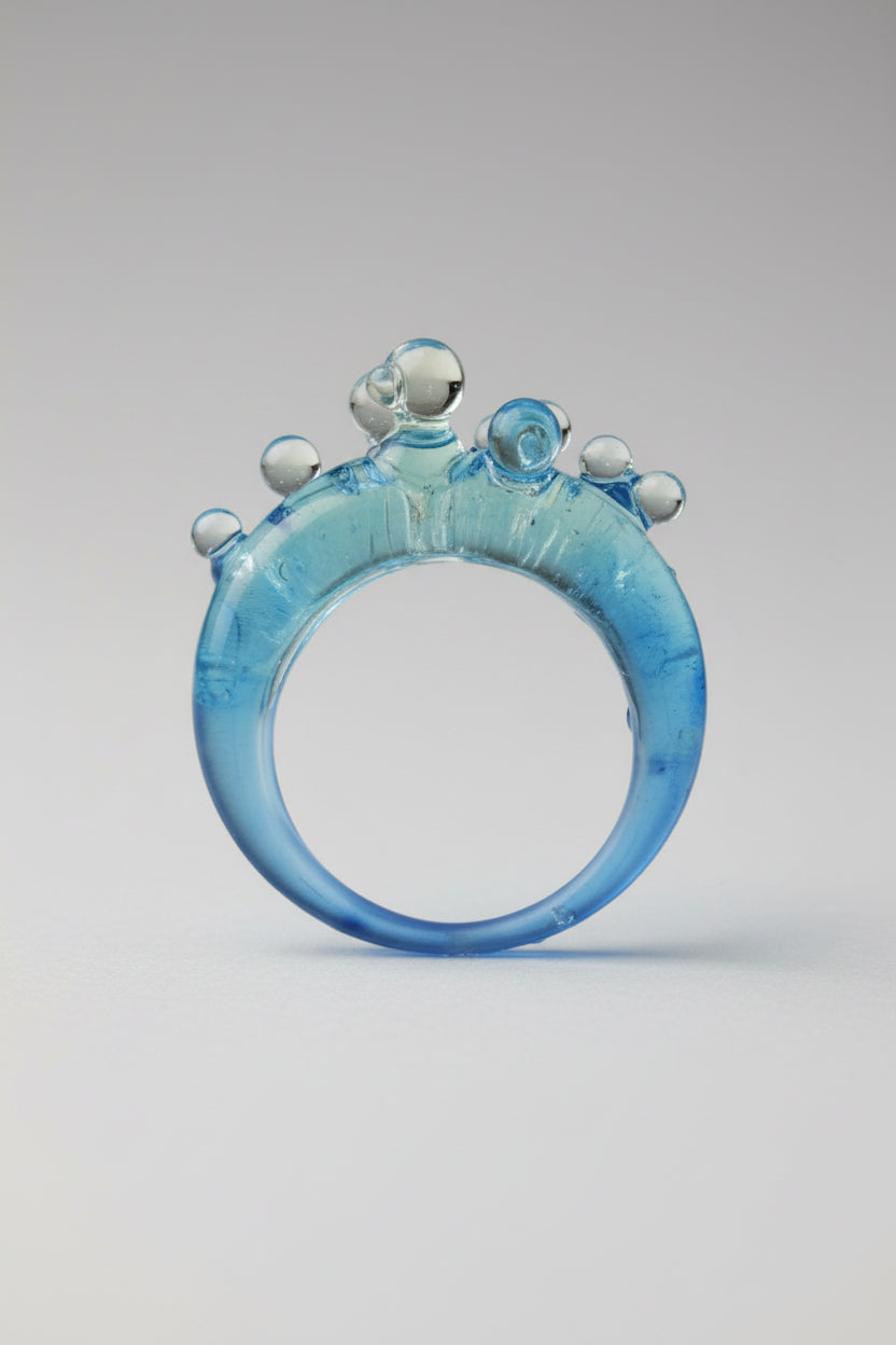 Ice Blue Bubble Ring styled as a statement accessory with a minimalist outfit, showcasing the "fresh note of color" design
