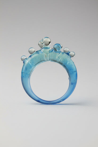 Ice Blue Bubble Ring styled as a statement accessory with a minimalist outfit, showcasing the "fresh note of color" design
