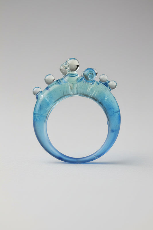 Ice Blue Bubble Ring styled as a statement accessory with a minimalist outfit, showcasing the "fresh note of color" design