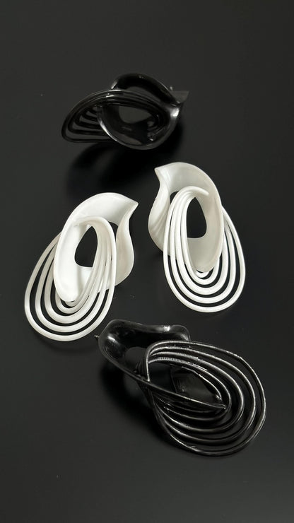 Comparison of the black and white costume jewelry color options.