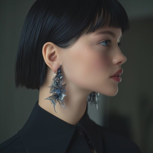 Video of petal cascade sculptural earrings showing the fluid movement.