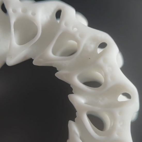white bold statement 3d printed earrings video show very close