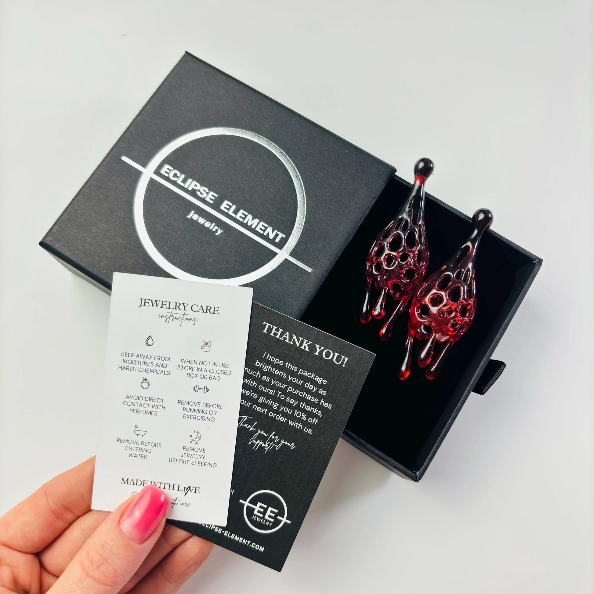 Passion color accessories presented in branded packaging.