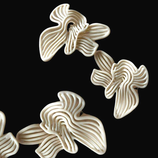 Boho statement earrings (Rhythm Beige) front view, showing the subtle sculptural texture