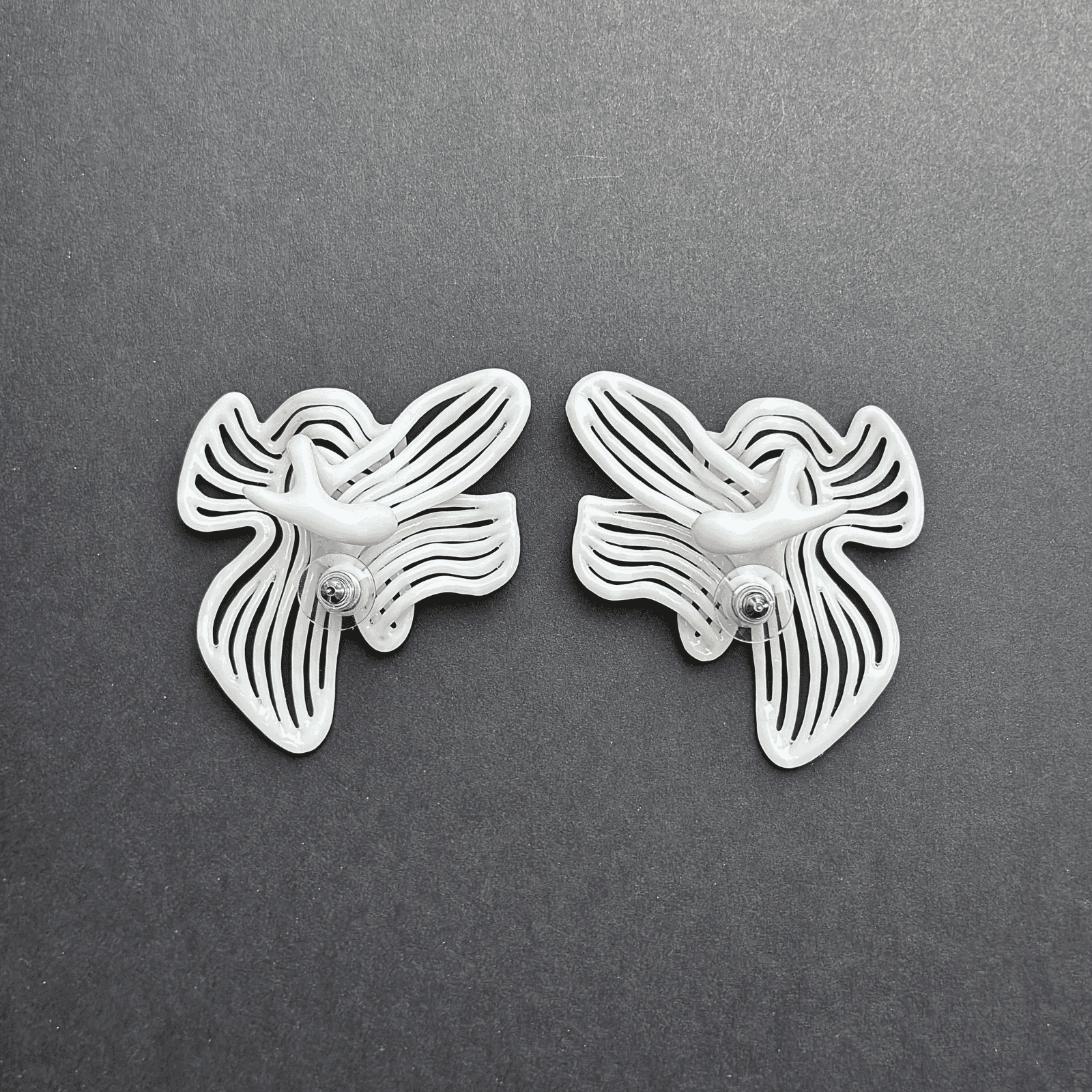 Studio photograph of wedding statement earrings on a clean background.