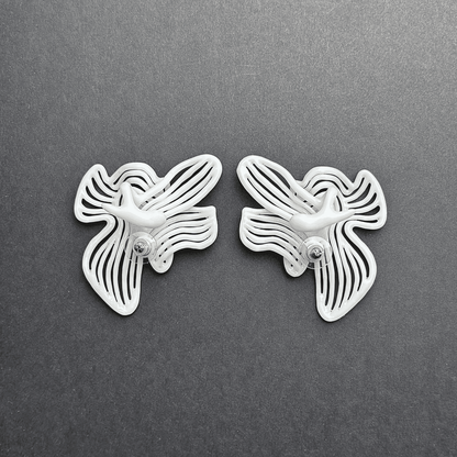 Studio photograph of wedding statement earrings on a clean background.