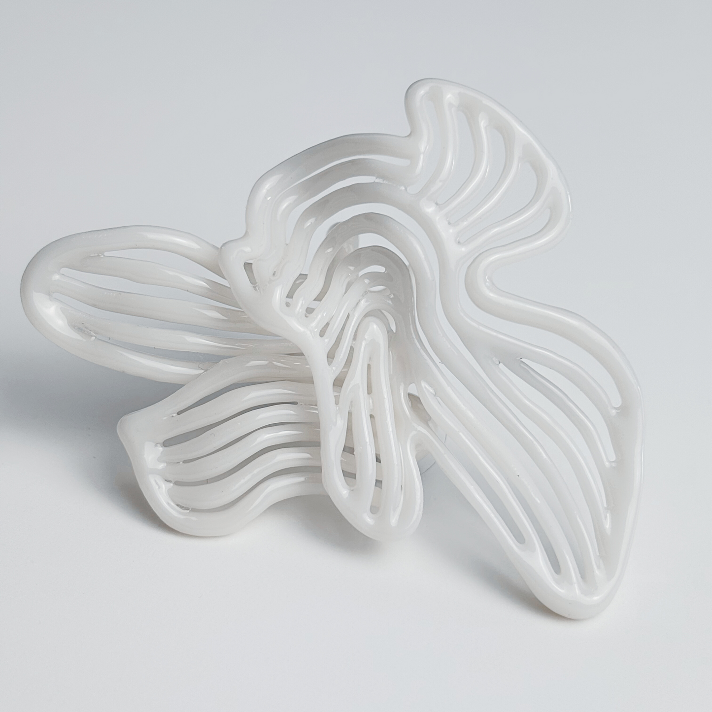 3d earring on a light gray background